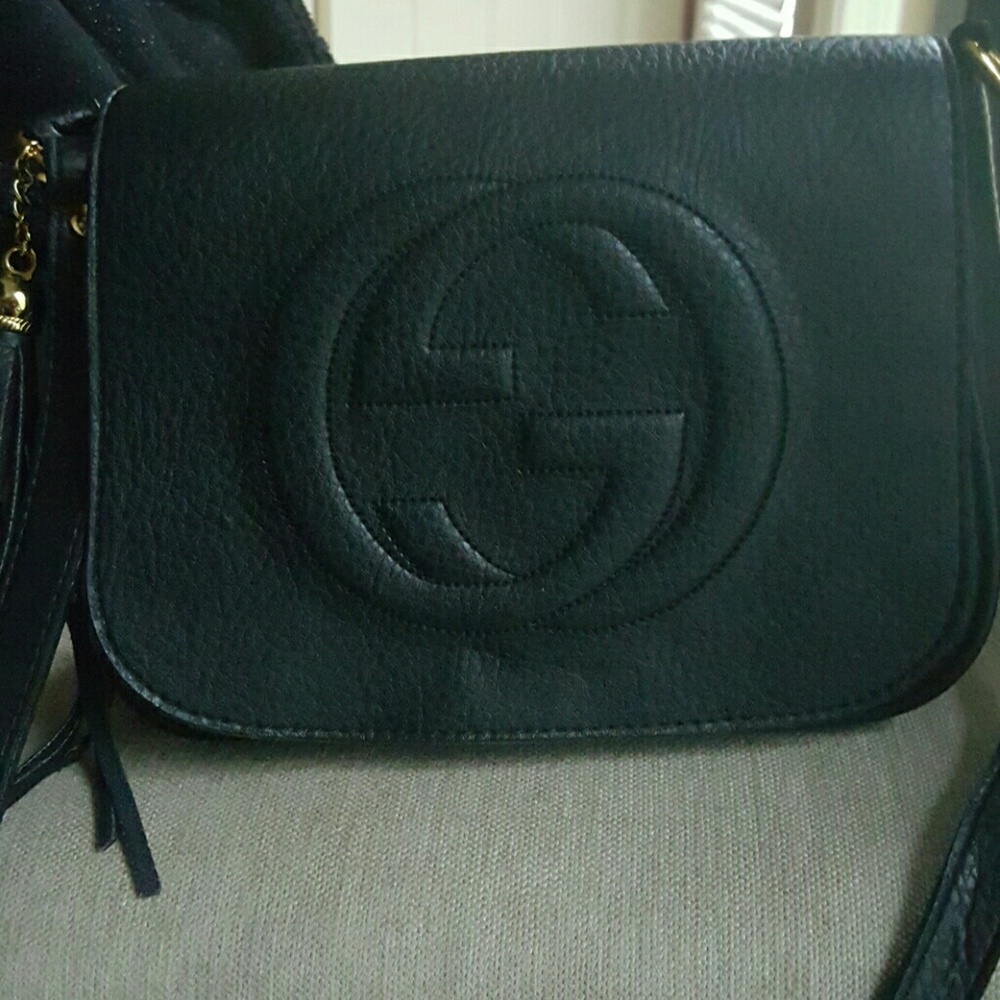 Black Gucci Shoulder structured purse.